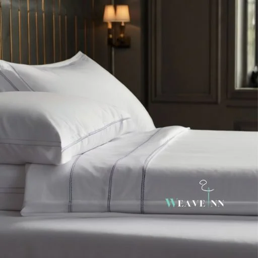 White hotel sheet on a bed