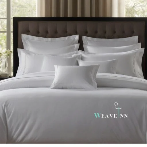 A bed with plain white hotel sheet and pillows