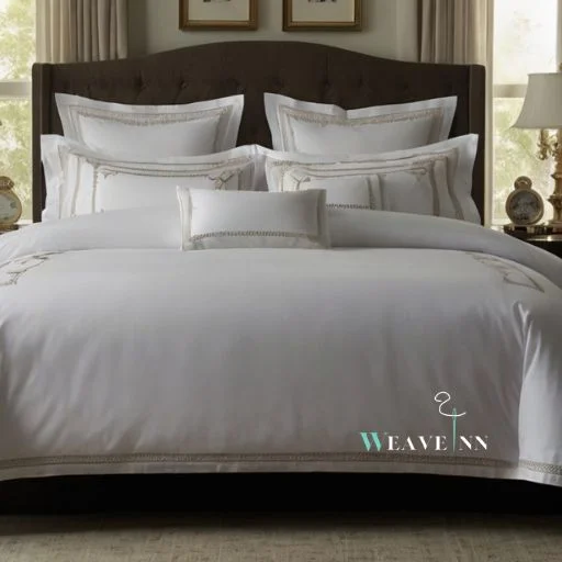 A bed of hotel white percale sheet and pillows on it